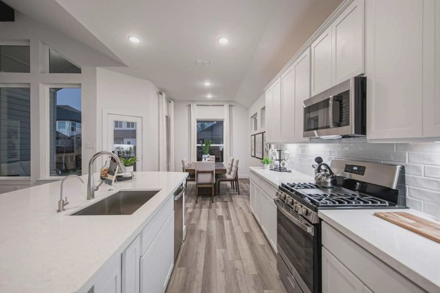 Representative furnished interior of a home built from the Barron by Chesmar Homes in Lariat, Liberty Hill (Image 7).