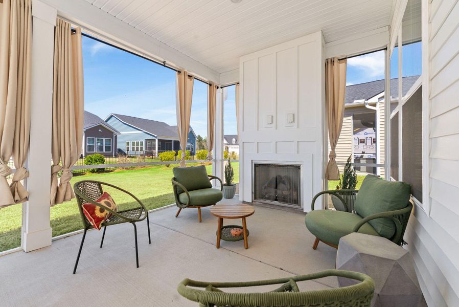 Exterior details and patio area of a home in Summerwind Crossing at Lakes of Cane Bay, Summerville (Image 4).