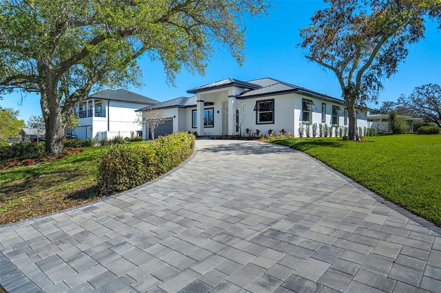 Front exterior of a new home in , Largo, FL, highlighting curb appeal (Image 25).