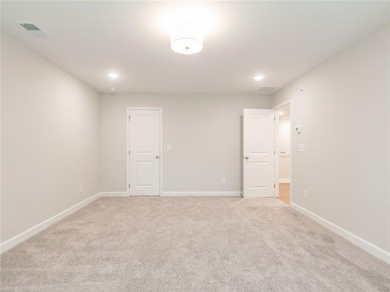 Spacious, unfurnished interior of a new home in River Walk Place, Lawrenceville (Image 37).