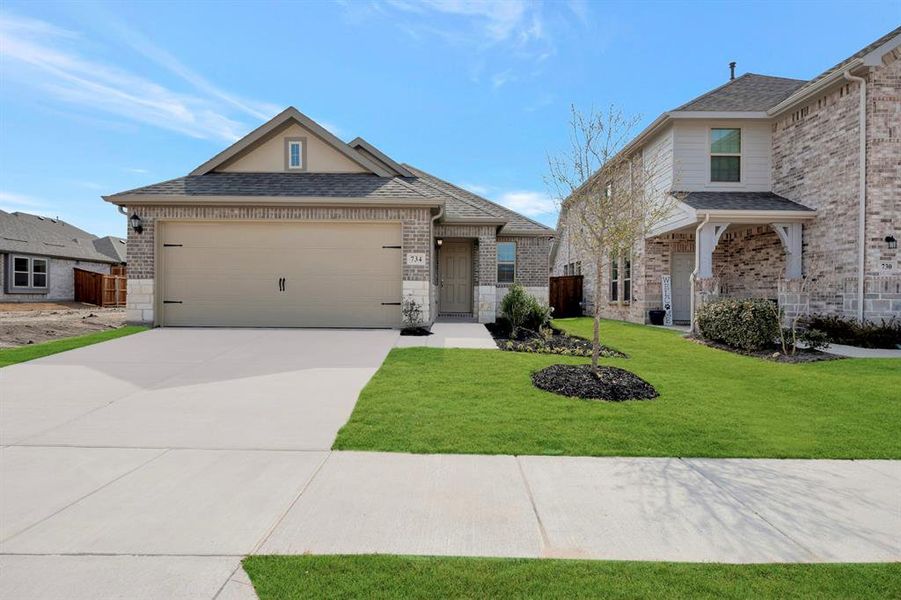 Front exterior of a new home in Elevon, Lavon, TX, highlighting curb appeal (Image 24). Front exterior of a new home in Elevon, Lavon, TX, highlighting curb appeal (Image 24).
