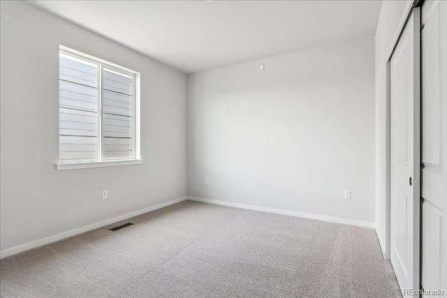 Spacious, unfurnished interior of a new home in Floret Collection at Parkdale Commons, Lafayette (Image 18).