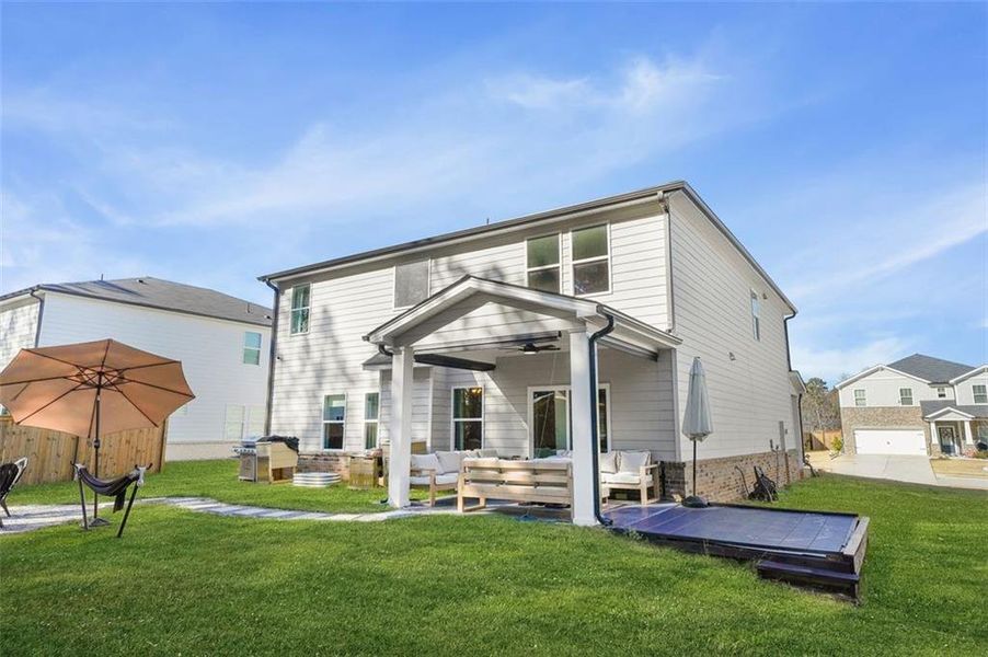 Exterior details and patio area of a home in , Loganville (Image 30).