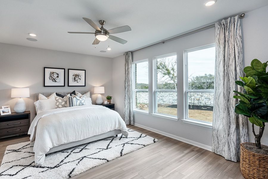Representative furnished interior of a home built from the Bordeaux by Taylor Morrison in Travisso, Leander (Image 9).