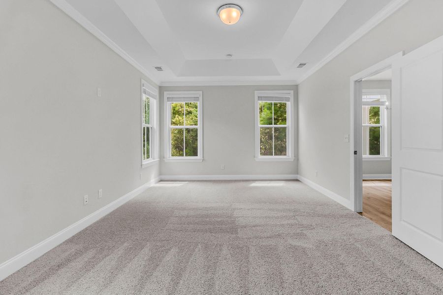 Spacious, unfurnished interior of a new home in Tidewater at Lakes of Cane Bay, Summerville (Image 16).