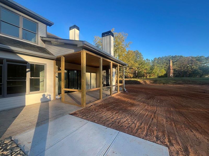 Exterior details and patio area of a home in , White (Image 31).