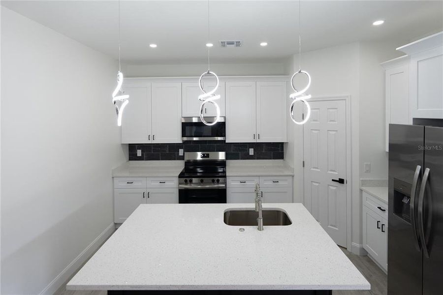 Furnished interior view inside a new home in , Apopka (Image 5).