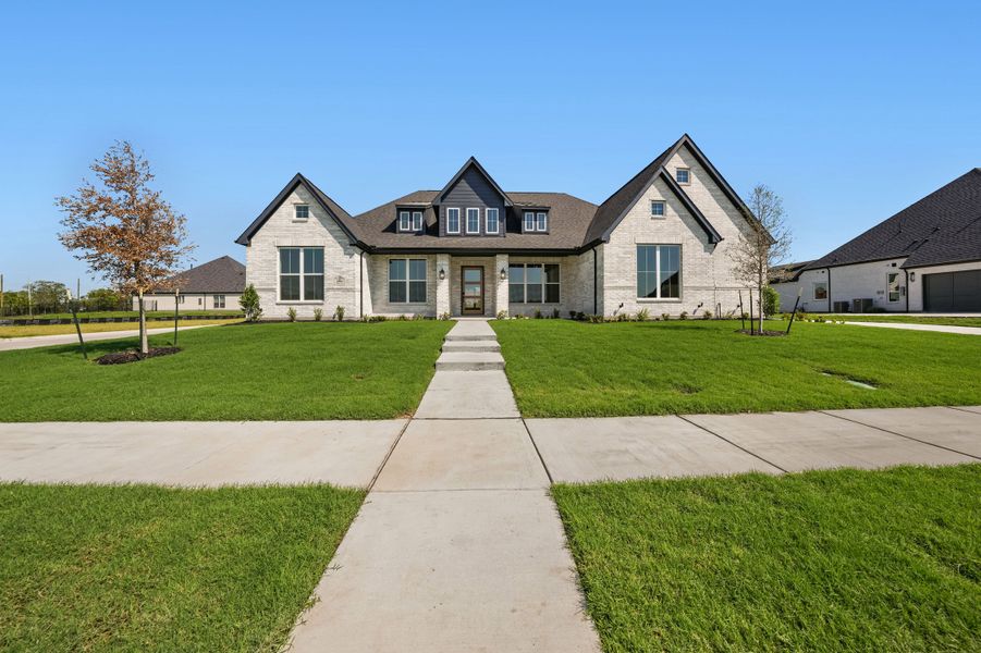 Front exterior of a new home in Winding Creek, Rockwall, TX, highlighting curb appeal (Image 25).