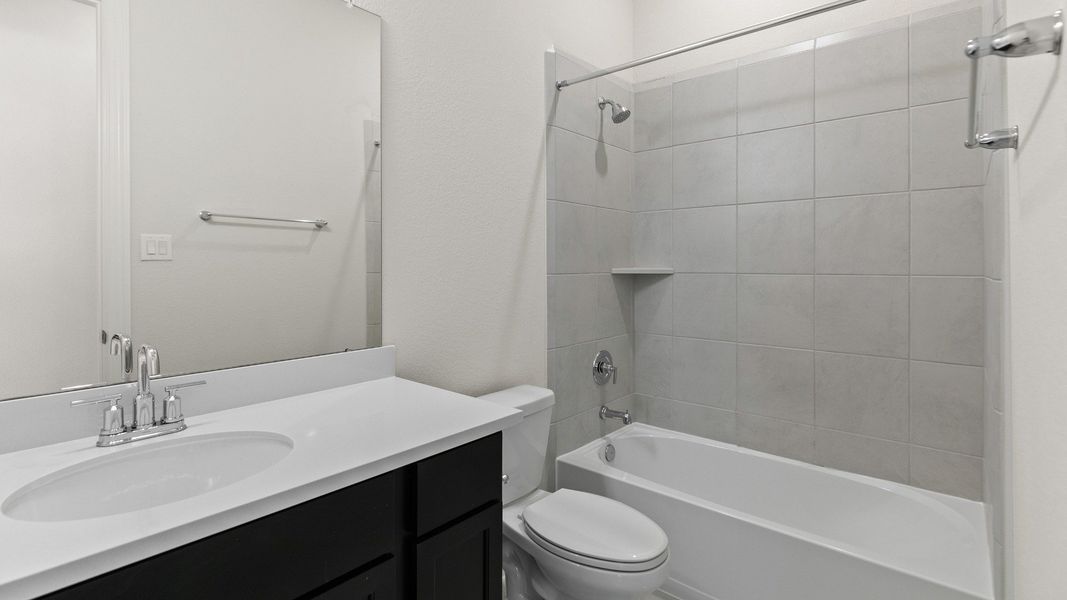 Representative furnished interior of a home built from the Yale by DRB Homes in Brookewater, Rosenberg (Image 16).