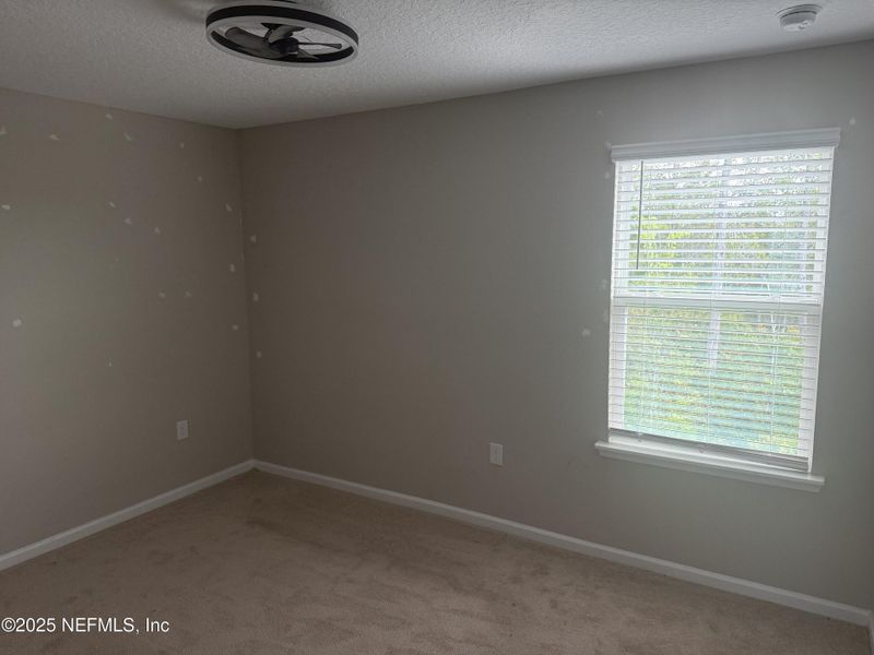 Spacious, unfurnished interior of a new home in River Glen, Yulee (Image 6).