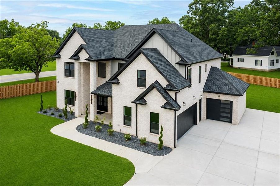 Front exterior of a new home in , Grayson, GA, highlighting curb appeal (Image 28). Front exterior of a new home in , Grayson, GA, highlighting curb appeal (Image 28).