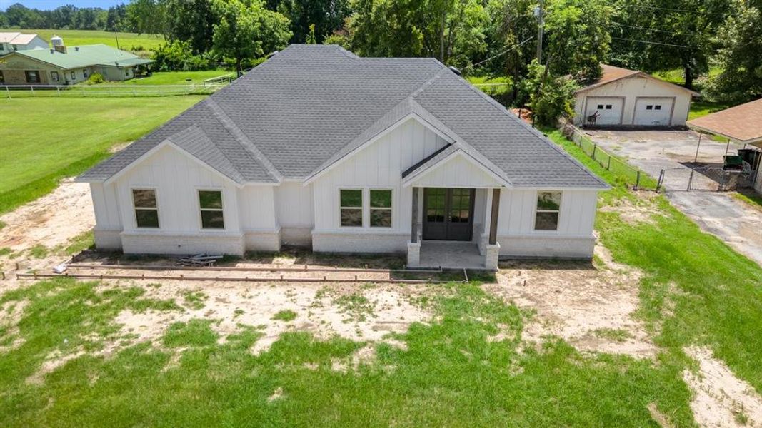 Front exterior of a new home in , Emory, TX, highlighting curb appeal (Image 12). Front exterior of a new home in , Emory, TX, highlighting curb appeal (Image 12).