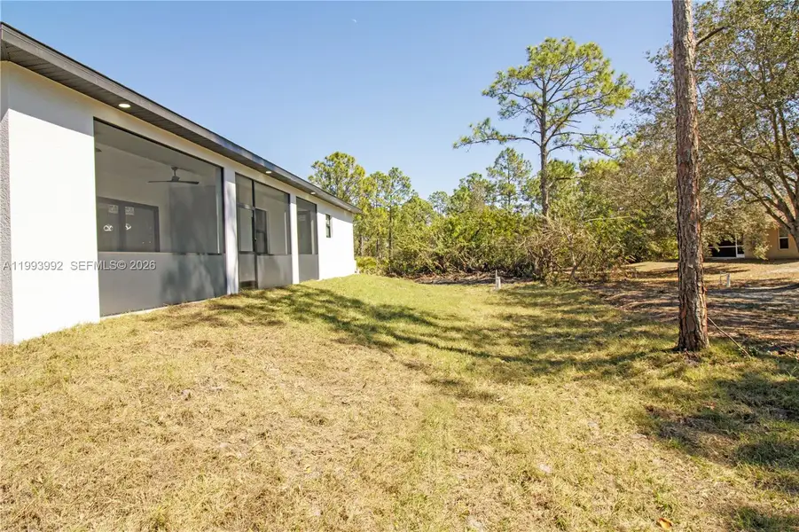 Exterior details and patio area of a home in , Lehigh Acres (Image 35).