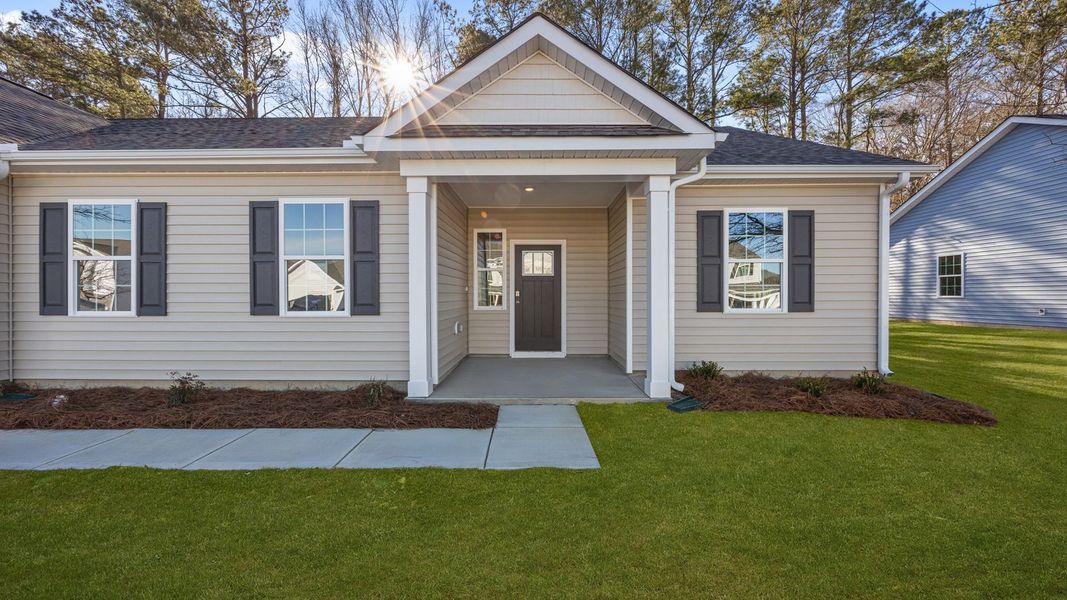 Exterior details and patio area of a home in Tyler - Home on the Lake, New Bern (Image 3).