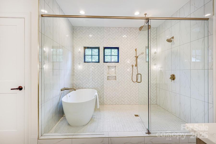 Primary bathroom freestanding tub and shower