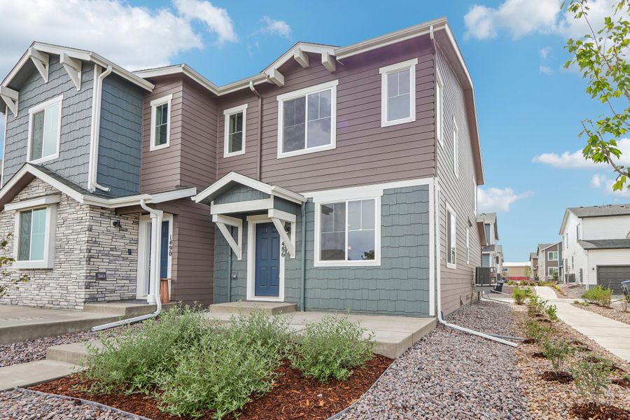 Front exterior of a new home in Spring Valley, Longmont, CO, highlighting curb appeal (Image 1). Front exterior of a new home in Spring Valley, Longmont, CO, highlighting curb appeal (Image 1).