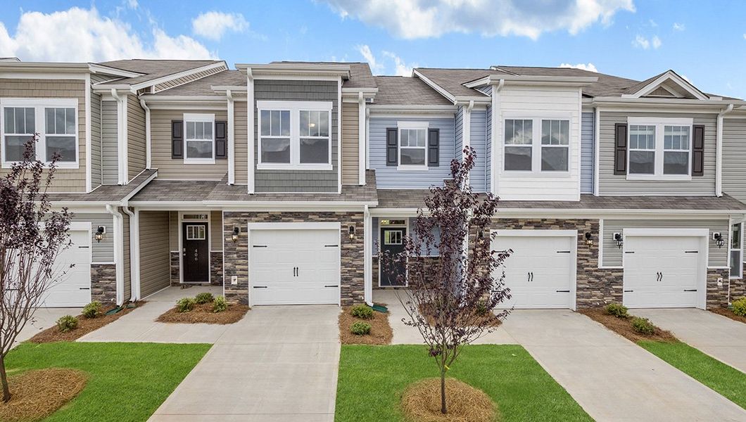 Front exterior of a new home in Skybrook Corners, Huntersville, NC, highlighting curb appeal (Image 1). Front exterior of a new home in Skybrook Corners, Huntersville, NC, highlighting curb appeal (Image 1).