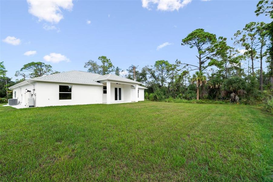 Exterior details and patio area of a home in , Port Charlotte (Image 2).