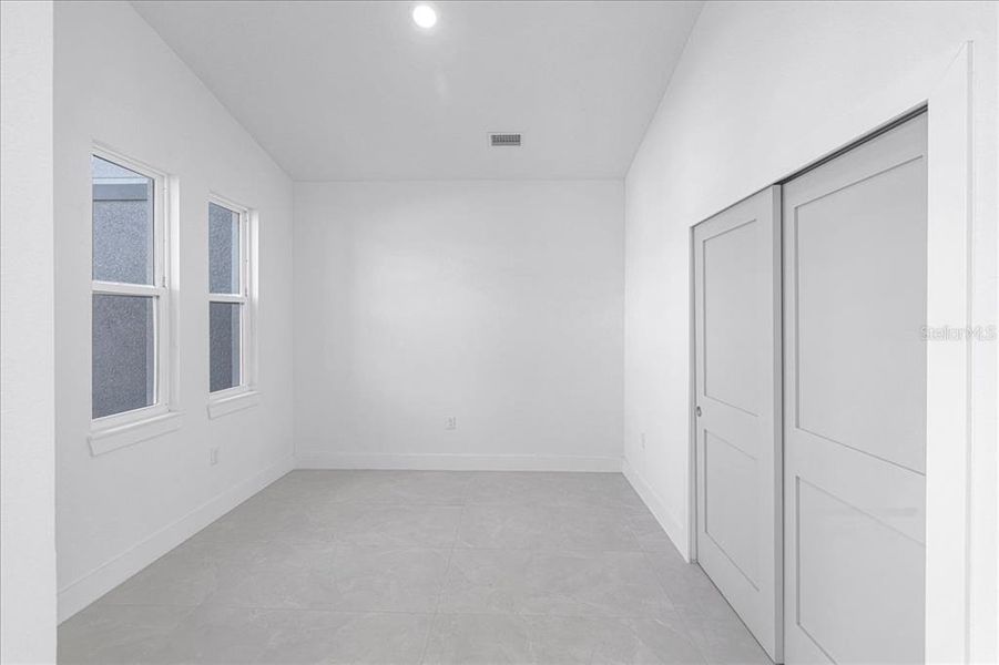 Spacious, unfurnished interior of a new home in , Port Charlotte (Image 31).
