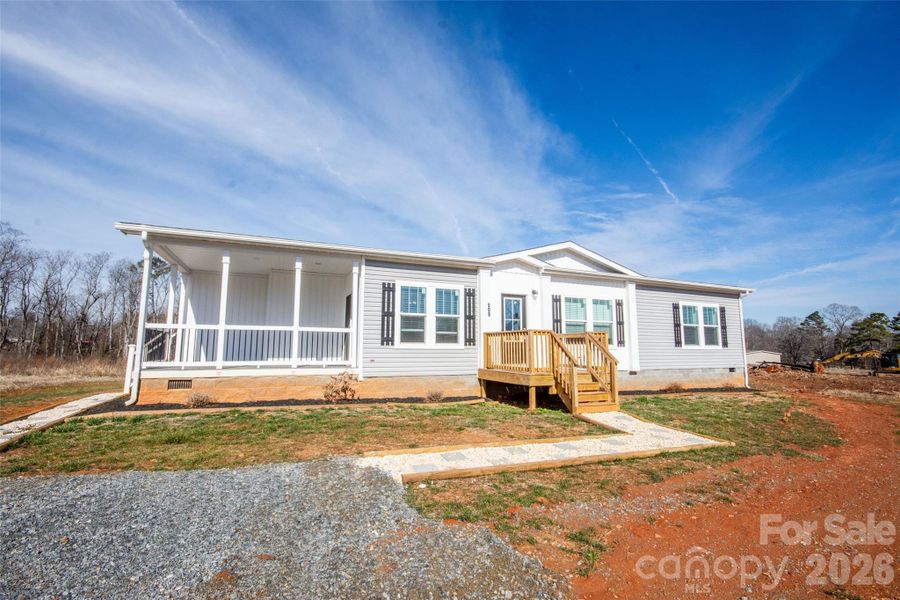 Exterior details and patio area of a home in , Hamptonville (Image 19).