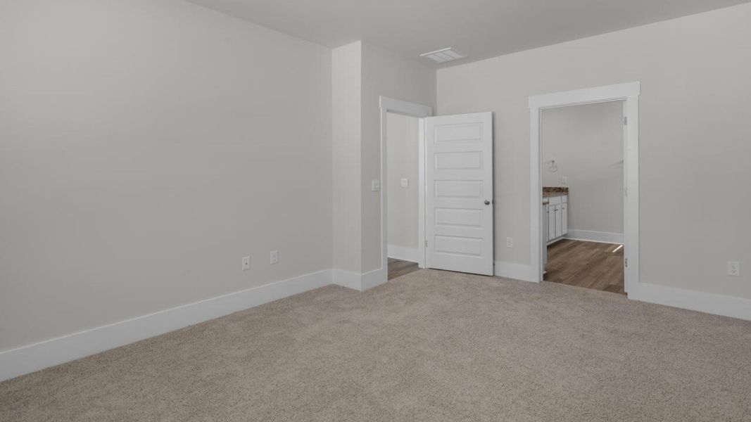 Spacious, unfurnished interior of a new home in Surfside Landing, Hubert (Image 17).