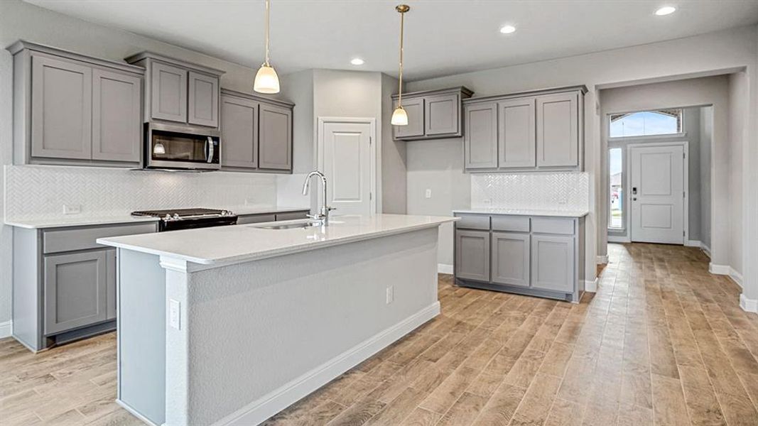 Kitchen - All Home and community information, including pricing, included features, terms, availability and amenities, are subject to change at any time without notice or obligation. All Drawings, pictures, photographs, video, square footages, floor plans, elevations, features, colors and sizes are approximate for illustration purposes only and will vary from the homes as built.