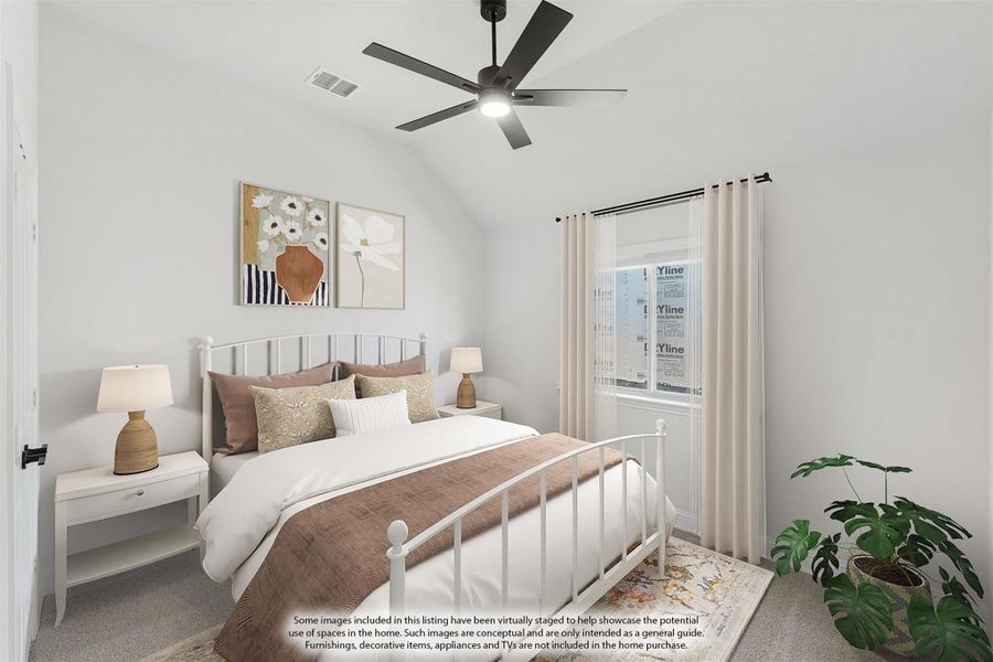 Bedroom with vaulted ceiling, ceiling fan, white metal bed frame, and carpet flooring