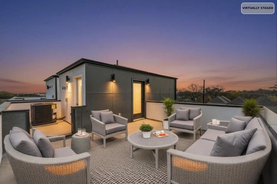 Virtually staged rooftop at dusk.