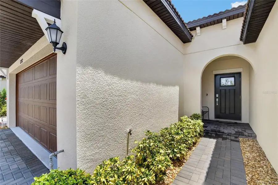 Exterior details and patio area of a home in Southshore Bay Active Adult, Wimauma (Image 4).