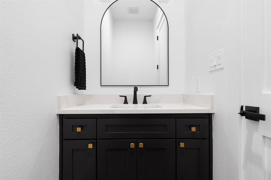 Half bathroom with vanity