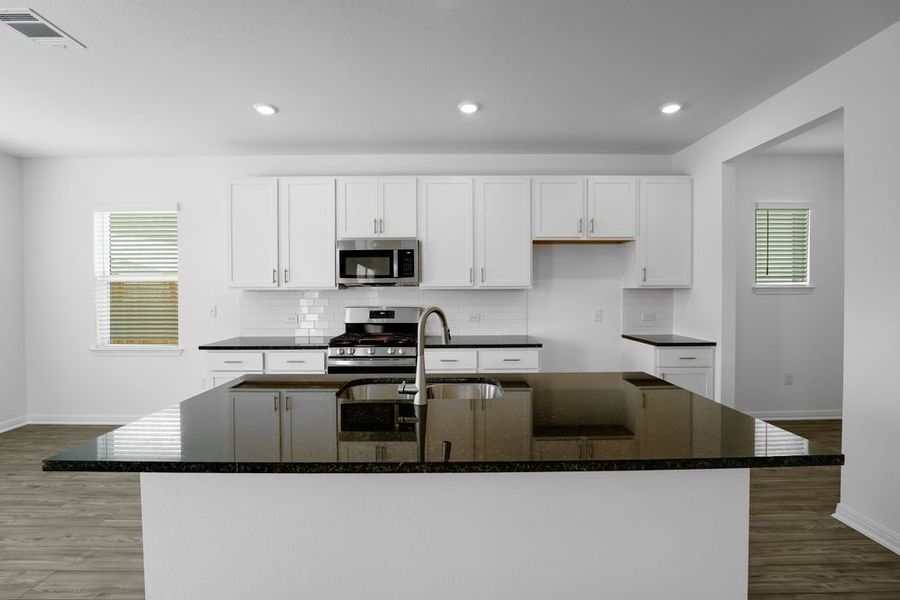 Furnished interior view inside a new home in Longview 40s, Del Valle (Image 4).