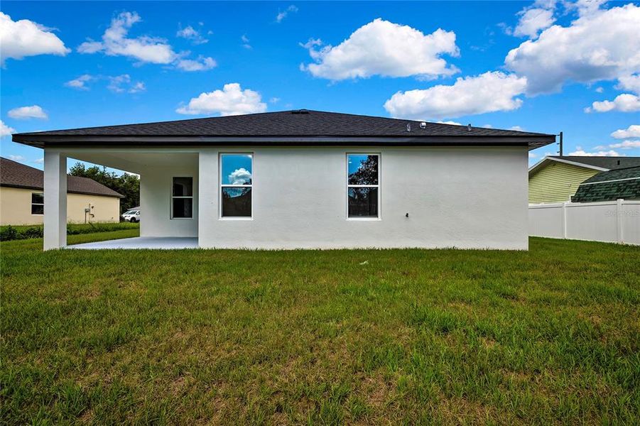 Front exterior of a new home in , Spring Hill, FL, highlighting curb appeal (Image 25). Front exterior of a new home in , Spring Hill, FL, highlighting curb appeal (Image 25).