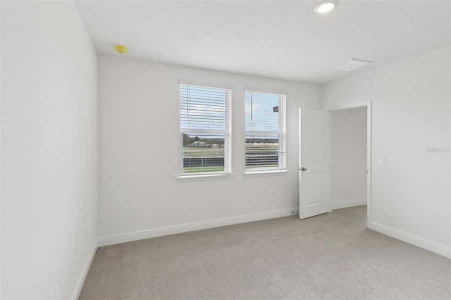 Spacious, unfurnished interior of a new home in The Reserve at Hammock Oaks - Classic Series, Lady Lake (Image 27). Spacious, unfurnished interior of a new home in The Reserve at Hammock Oaks - Classic Series, Lady Lake (Image 27).