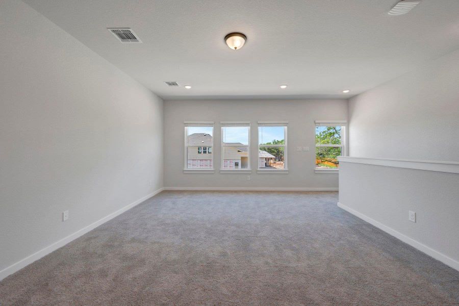 Spacious, unfurnished interior of a new home in Heritage, Dripping Springs (Image 21).