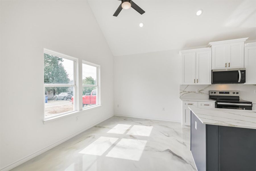 Furnished interior view inside a new home in Bridgeland, Cypress (Image 13).