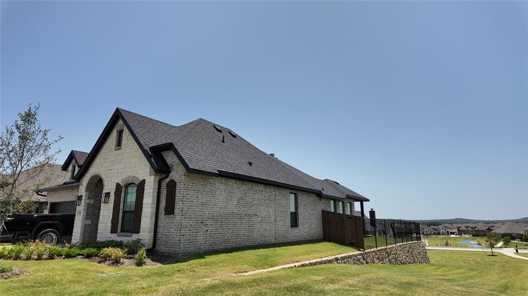 Exterior details and patio area of a home in Panchasarp Farms, Burleson (Image 3). Exterior details and patio area of a home in Panchasarp Farms, Burleson (Image 3).