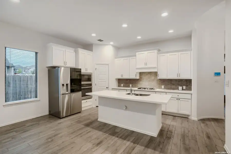 Furnished interior view inside a new home in Ladera, San Antonio (Image 9).