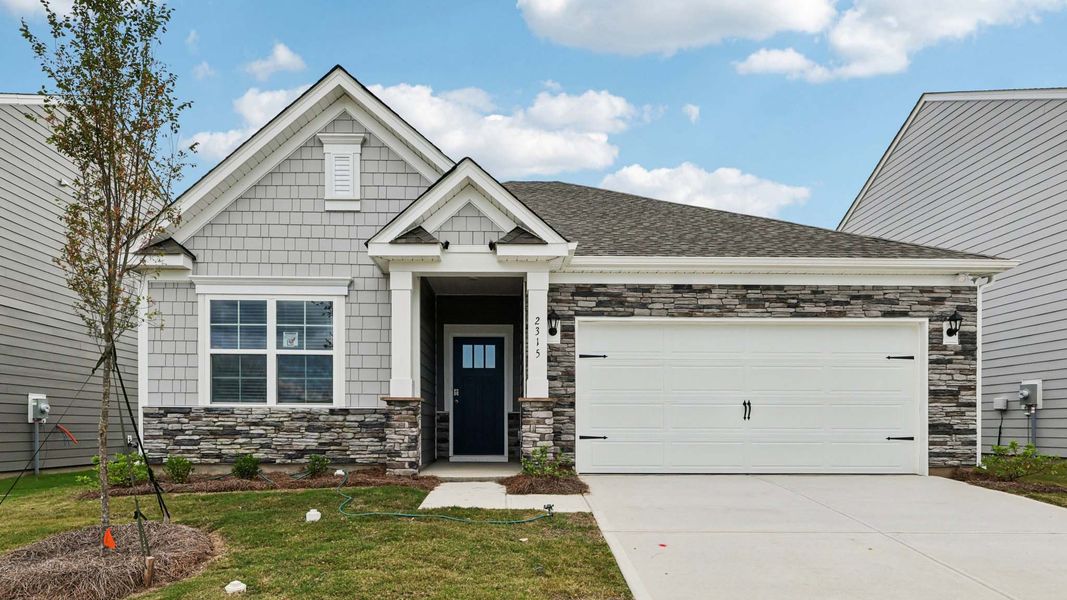 Front exterior of a new home in Bristol Terrace, Statesville, NC, highlighting curb appeal (Image 1). Front exterior of a new home in Bristol Terrace, Statesville, NC, highlighting curb appeal (Image 1).