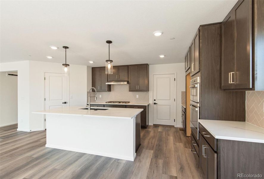 Furnished interior view inside a new home in Legato, Commerce City (Image 5).