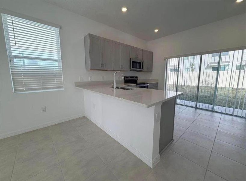 Furnished interior view inside a new home in , Kissimmee (Image 2). Furnished interior view inside a new home in , Kissimmee (Image 2).