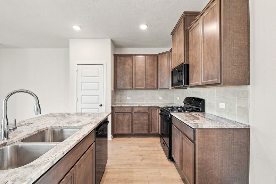 Furnished interior view inside a new home in Heartland at Creek Meadows, College Station (Image 4). Furnished interior view inside a new home in Heartland at Creek Meadows, College Station (Image 4).