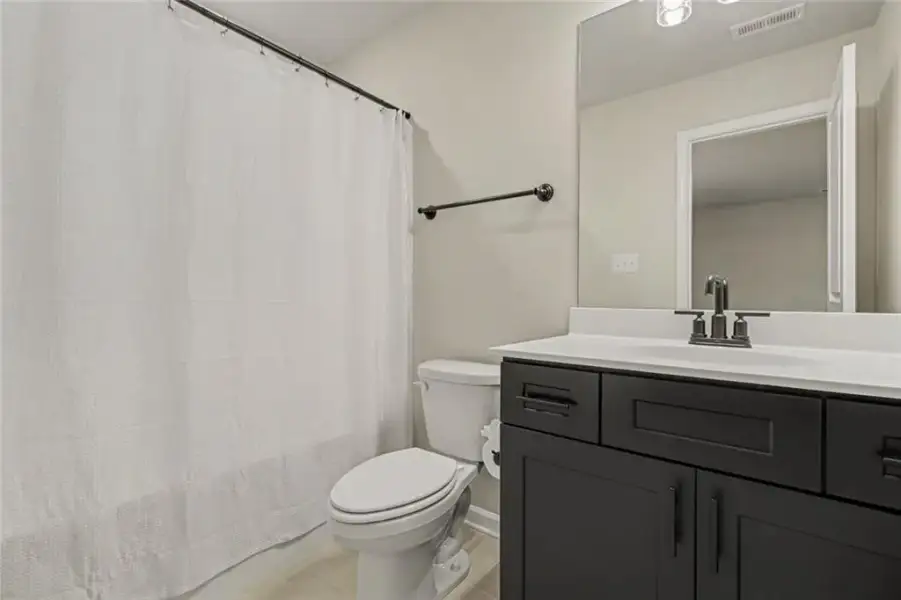 Furnished interior view inside a new home in , Newnan (Image 19). Furnished interior view inside a new home in , Newnan (Image 19).