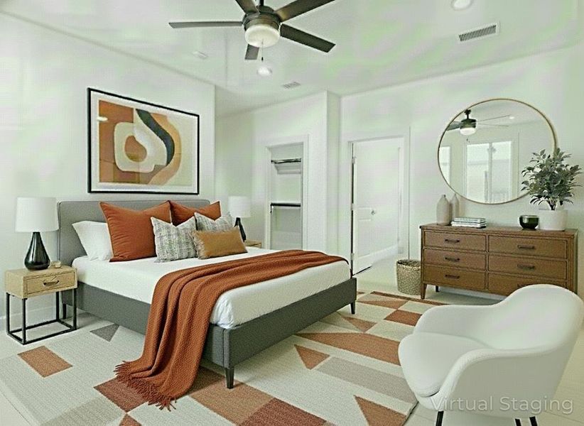 Carpeted bedroom featuring a ceiling fan Carpeted bedroom featuring a ceiling fan