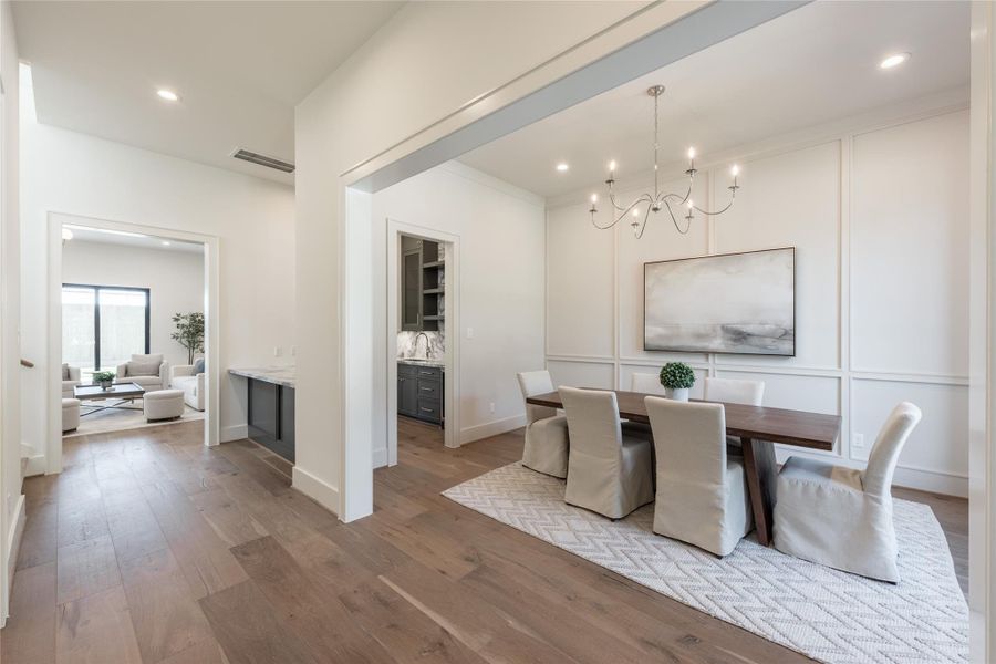 Defined by scale and openness, the space unfolds with intention where living and dining connect seamlessly through light and proportion.