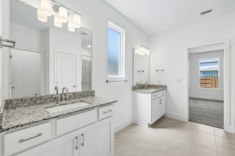 Furnished interior view inside a new home in Freedom at Anthem, Kyle (Image 11).