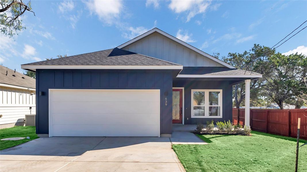 Front exterior of a new home in , Cottonwood Shores, TX, highlighting curb appeal (Image 1).