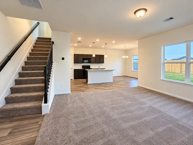 The Oriole II- Family Room into Kitchen