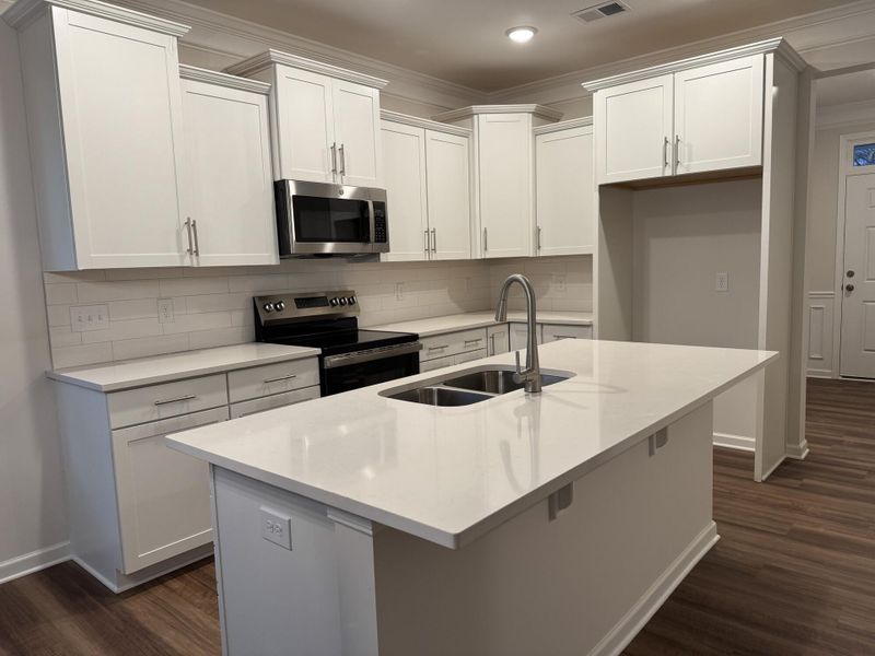 Furnished interior view inside a new home in East Main Townes, Spartanburg (Image 6).