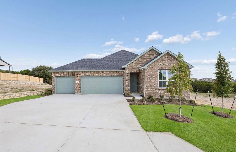 Front exterior of a new home in Crescent Bluff, Georgetown, TX, highlighting curb appeal (Image 19).