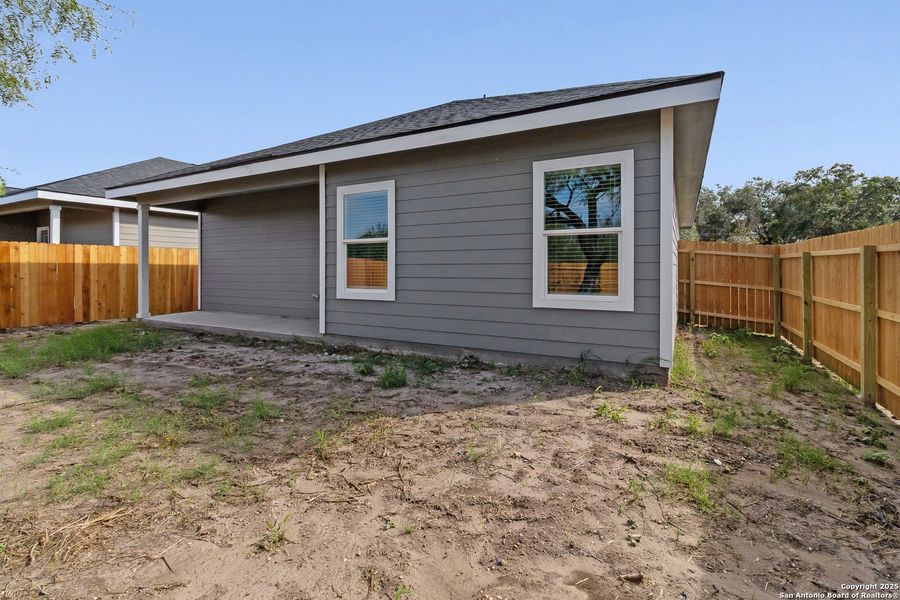 Exterior details and patio area of a home in , Beeville (Image 17).